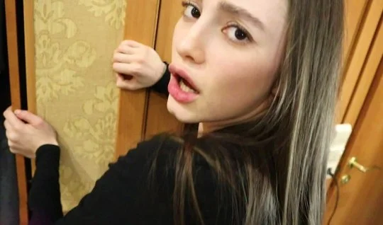 The guy takes a young girl in a Thong on her knees sucking his cock...
